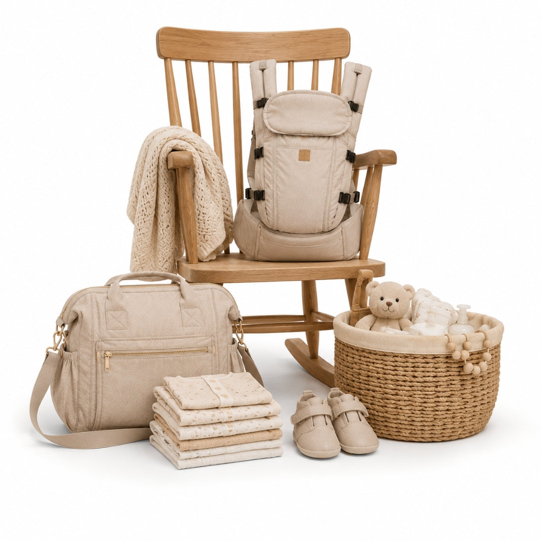 Beige baby carrier, bag, and accessories on a white background